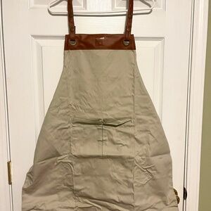 Apron with leather trim